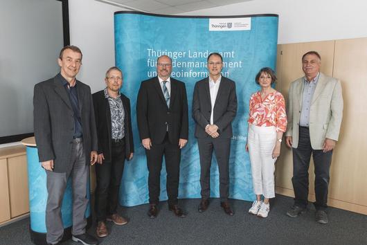 Foto des Staatssekretärs und der Abteilungsleiter sowie des Präsidenten